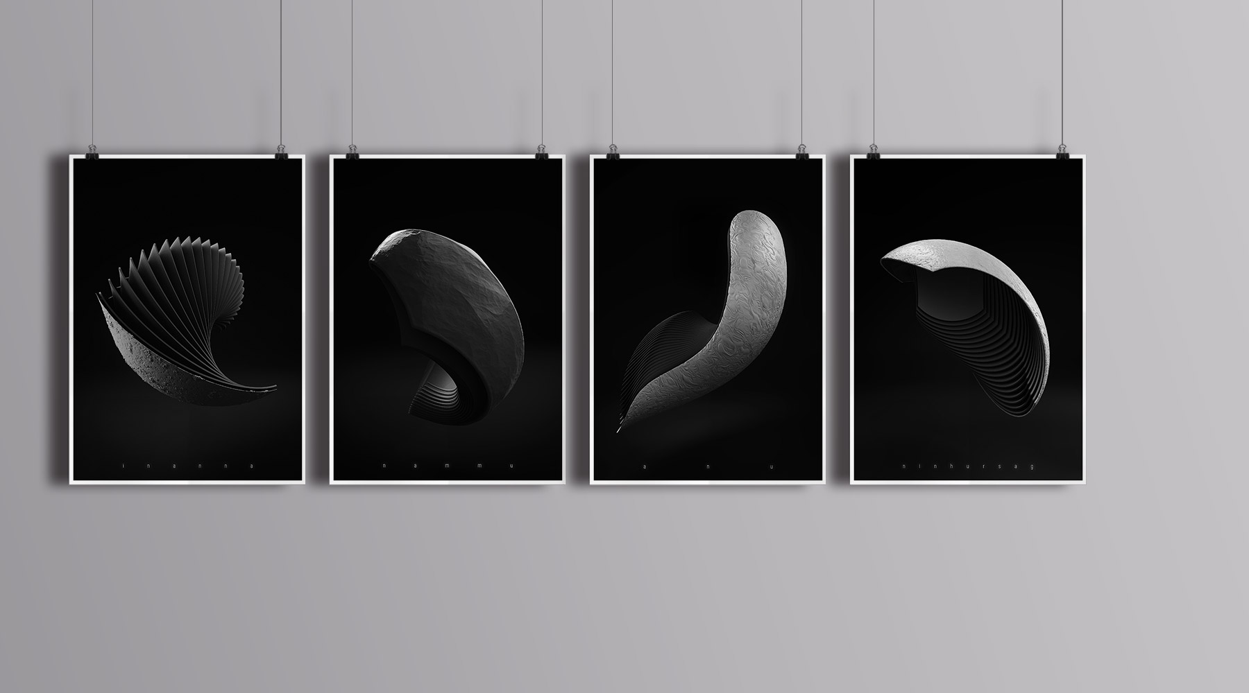 Four different Metaphorm 3D artwork posters hanging on strings on a gray wall