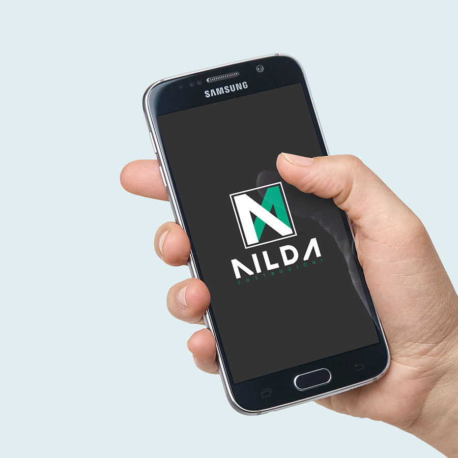 Smartphone showing a Nilda logo on the screen