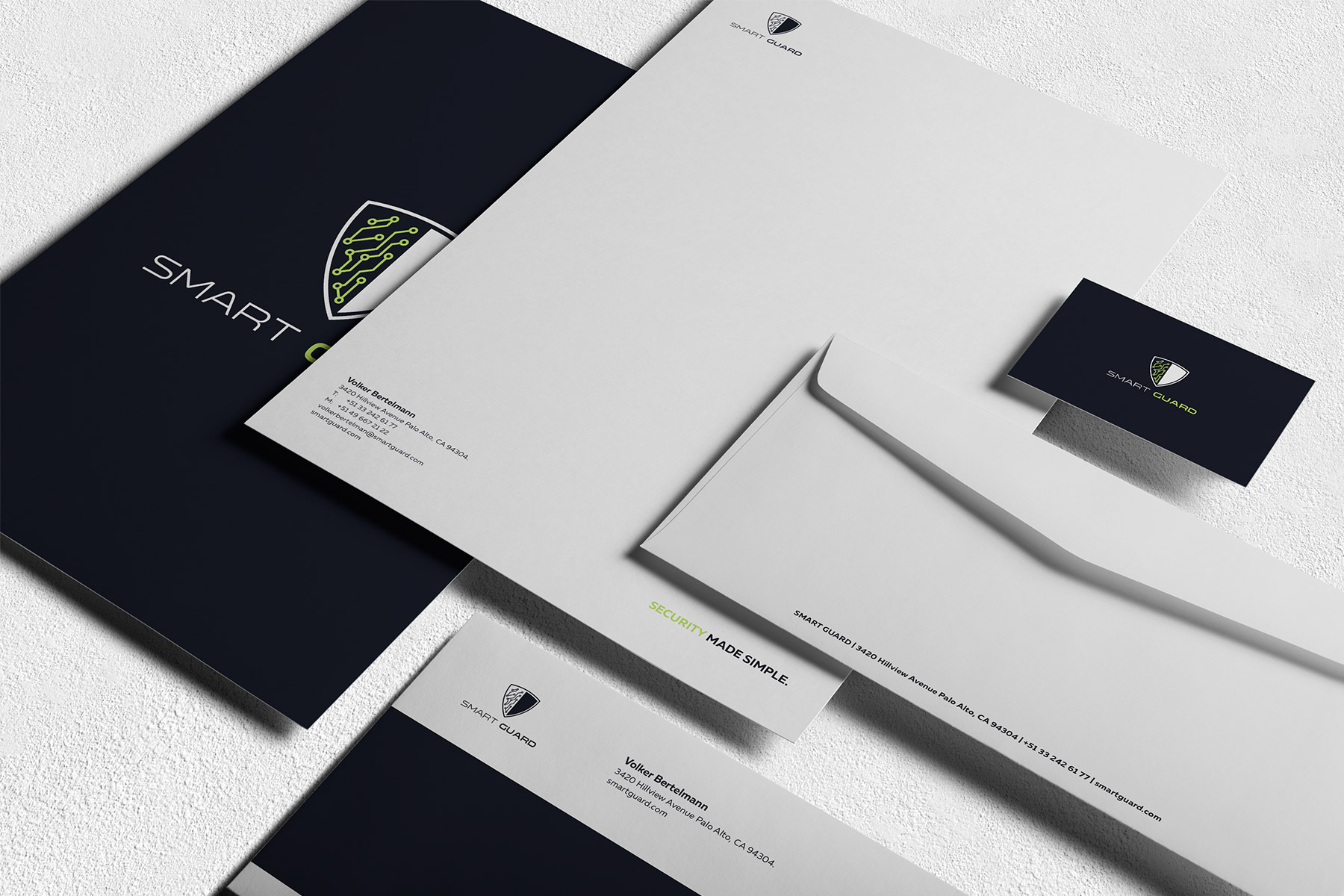 Villain branded etter envelope, A4 letter and a folder on a light surface
